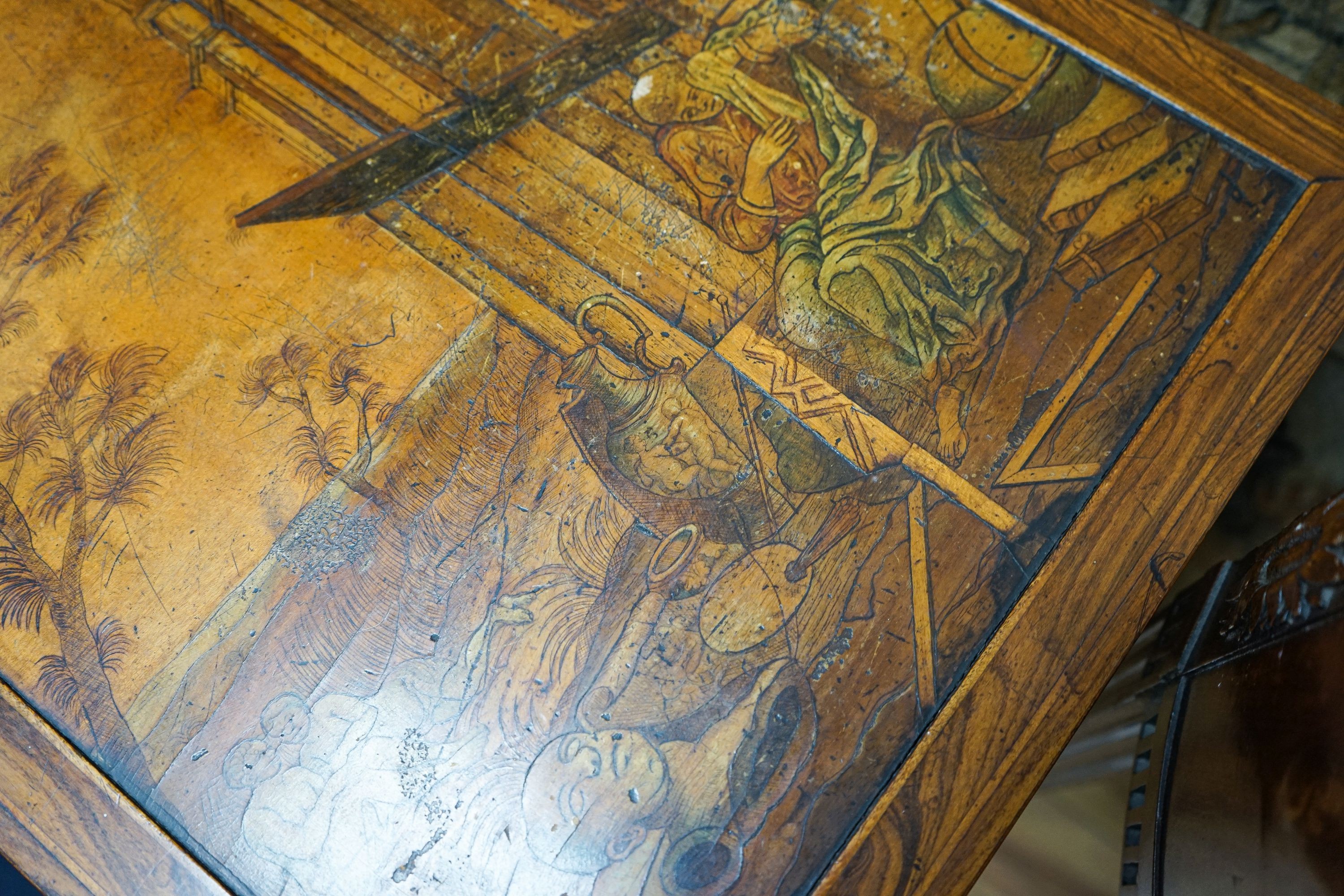 A 19th century Continental walnut side table, the top with penwork decoration and a tinted scene of figures among Roman ruins, width 41cm, depth 50cm, height 69cm